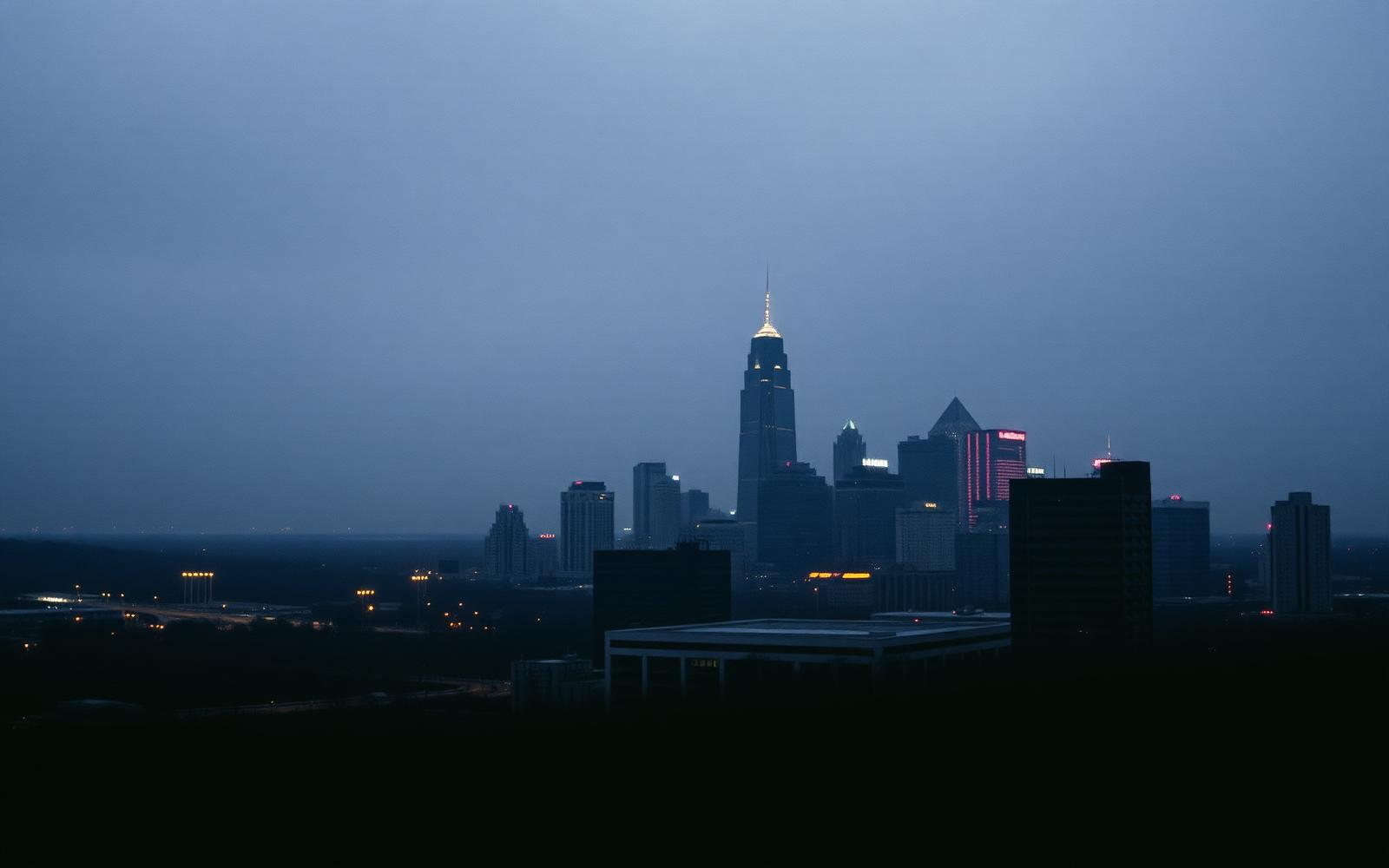 The Atlanta skyline at dusk through storm haze
